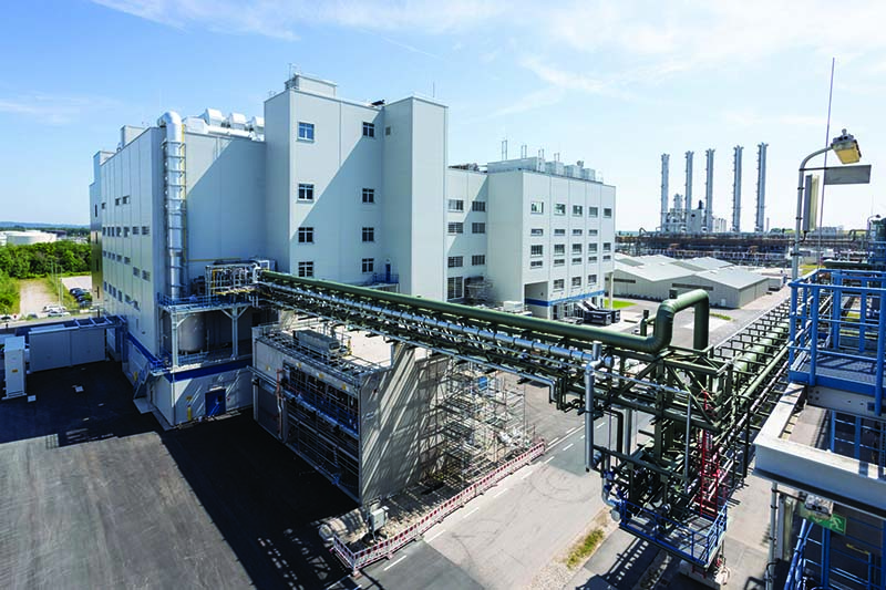 Wacker etching line next to building