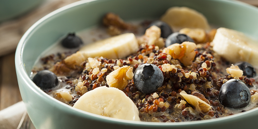 Healthy meal of quinoa, banana and blueberries